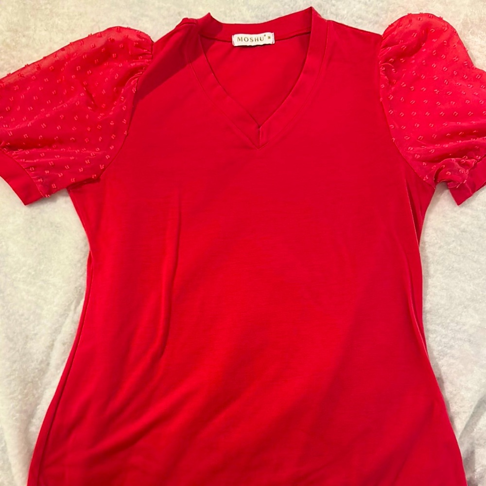 Like new women’s size medium top
